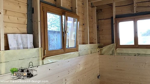 construction maison bois massif avec isolation