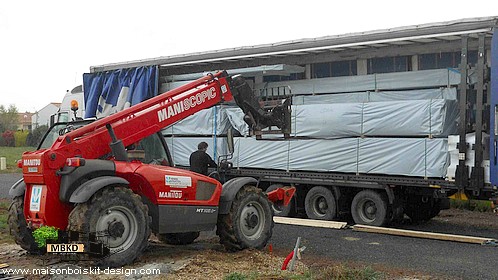 dechargement kit maison bois