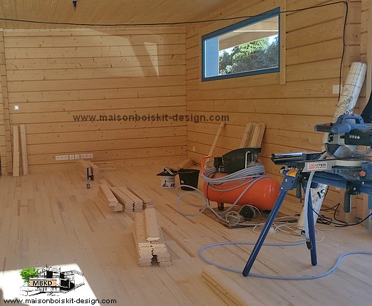 maison bois massif isole kit