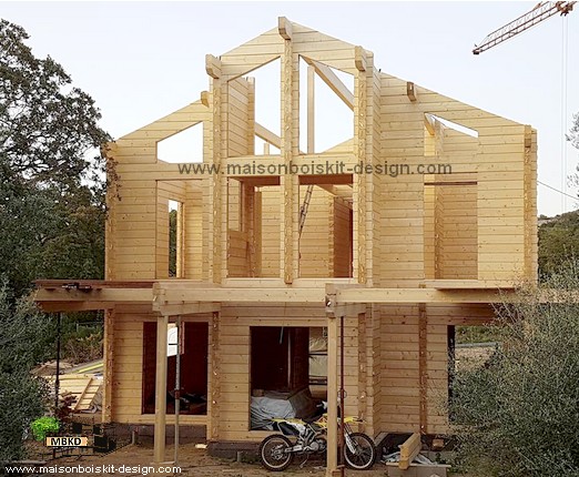 photo montage maison en bois en kit